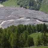 A Blatten, l'eau s'écoule lentement via la rivière.